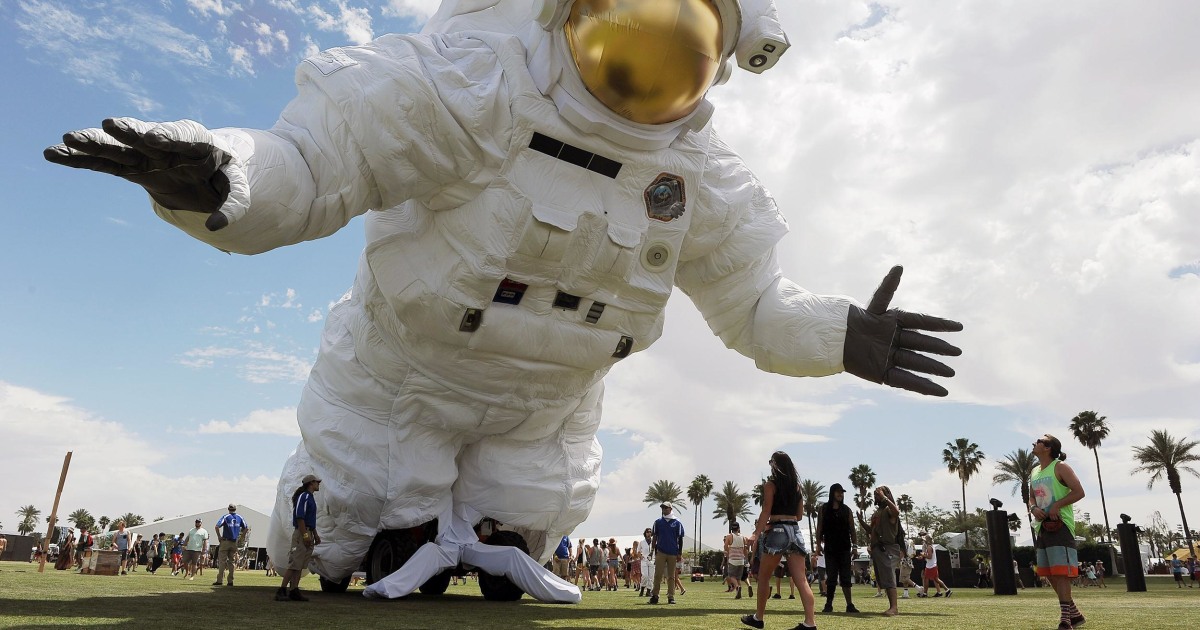 Giant Astronaut Sculpture Looms Over Coachella. — original article image